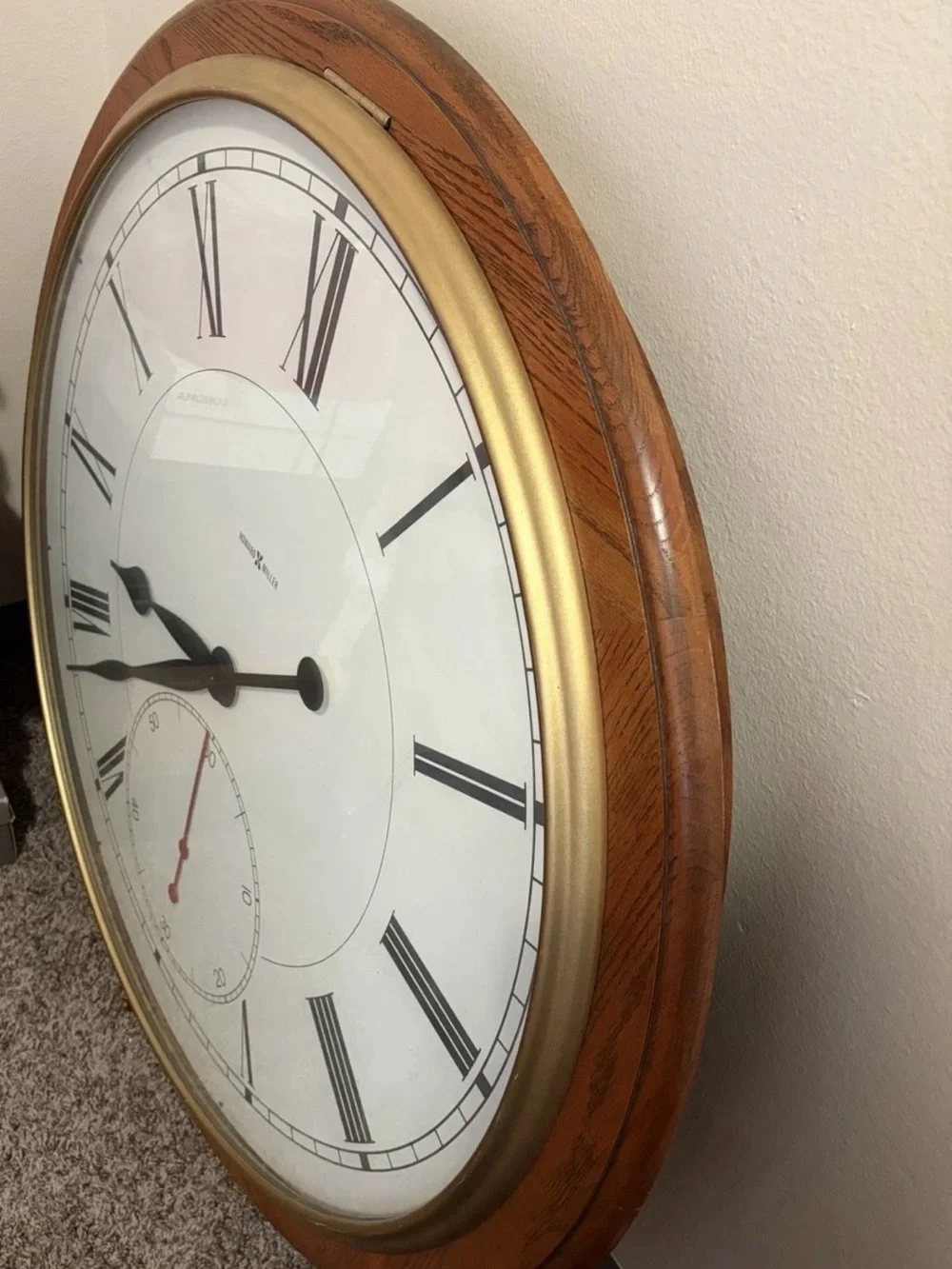 Howard Miller electric 42x42 Round wood frame wall clock analog Roman numerals
